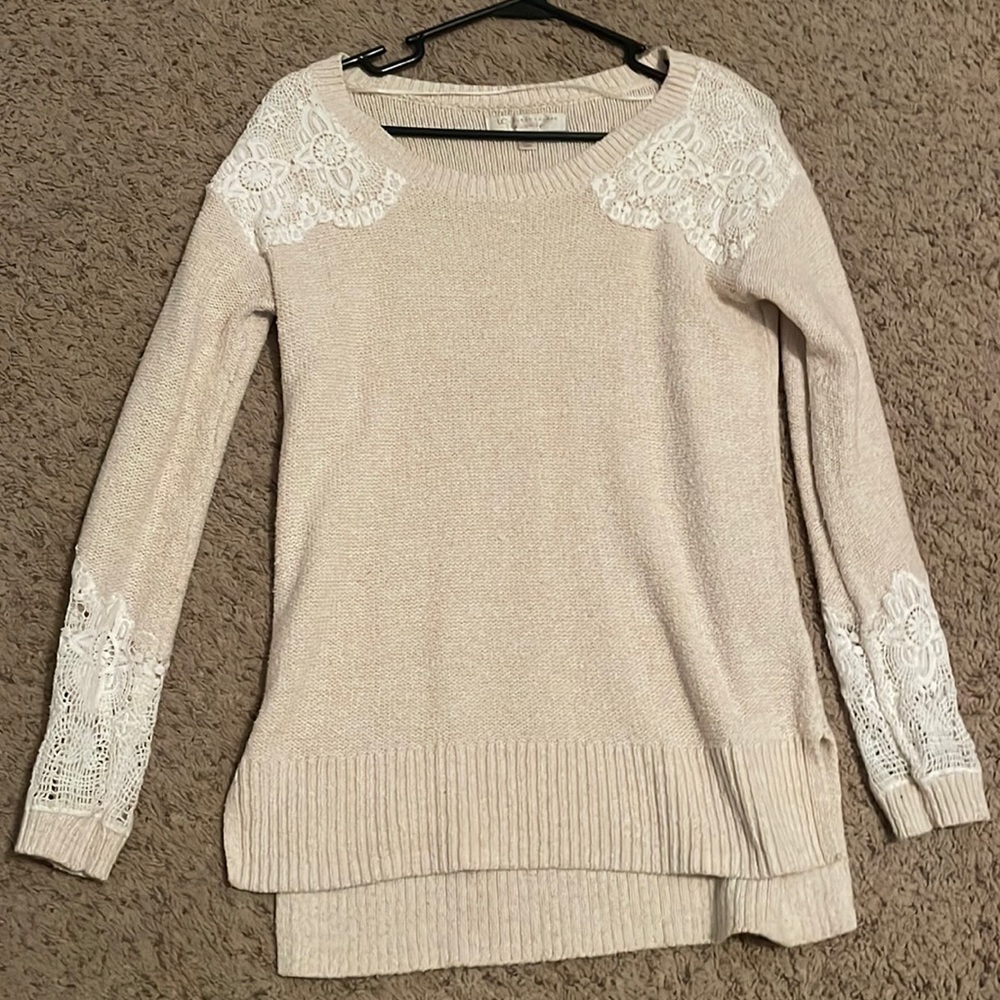 Small sweater with decorative lace